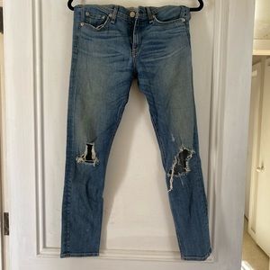 Rag and bone ankle cut denim with distressed rips.